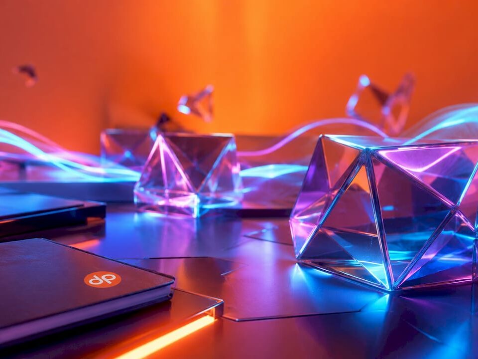 Abstract bright 3D shapes with neon glow representing planning