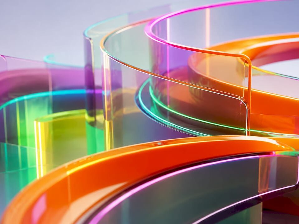 Bright 3D abstract tech shapes with glowing neon accents